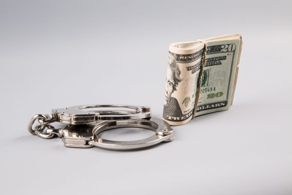 handcuffs-and-money-1462610133PVu.jpg